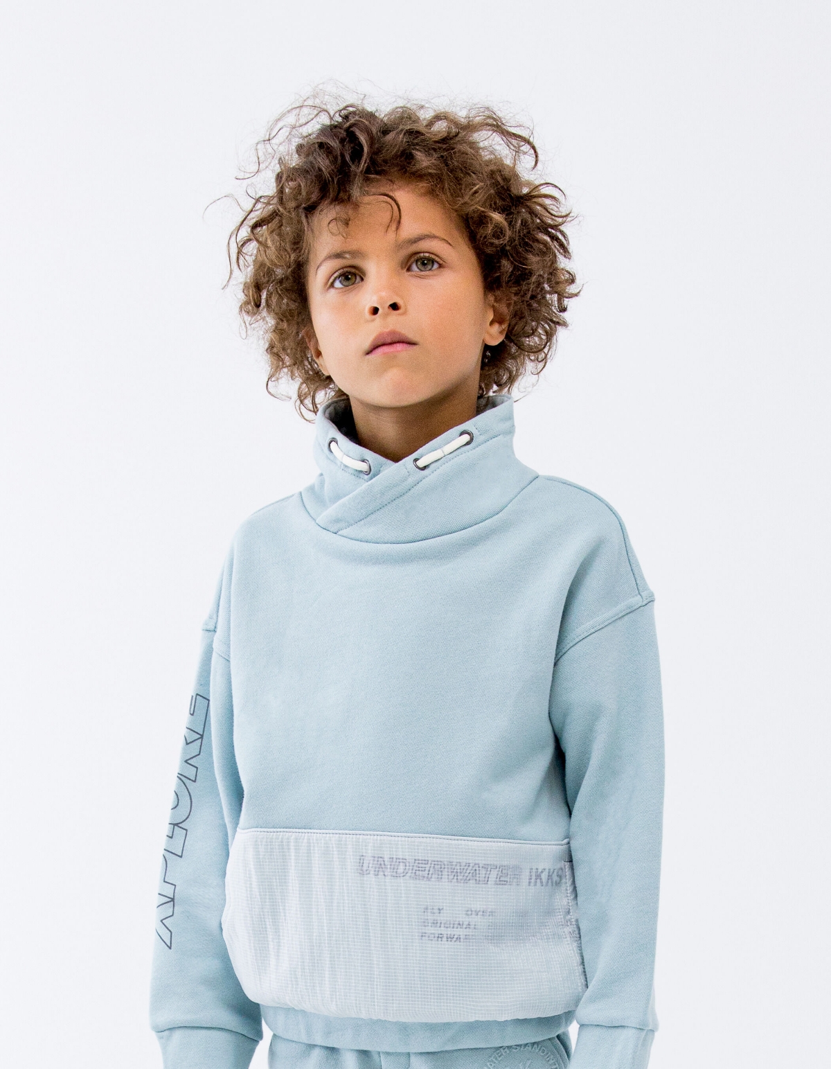 Sudadera aguamarina bolsillo nailon cuadriculado niño
