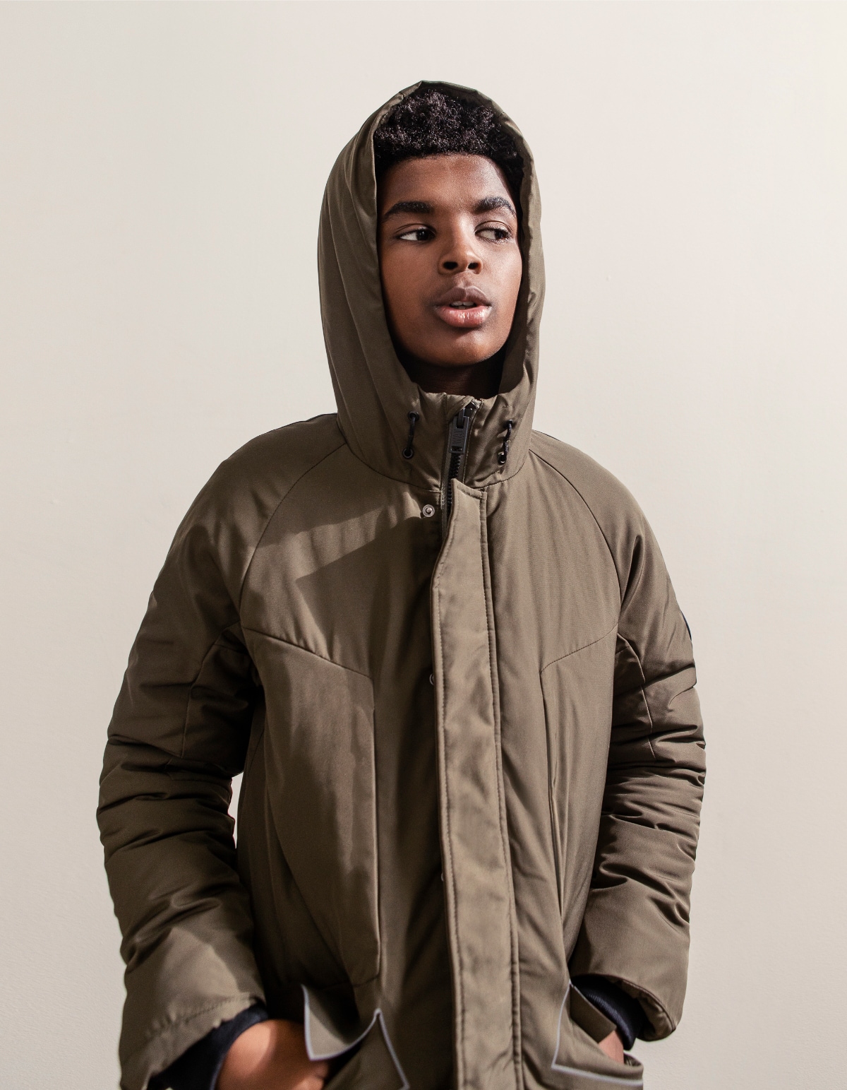 Boys’ bronze hooded parka with seamed flaps
